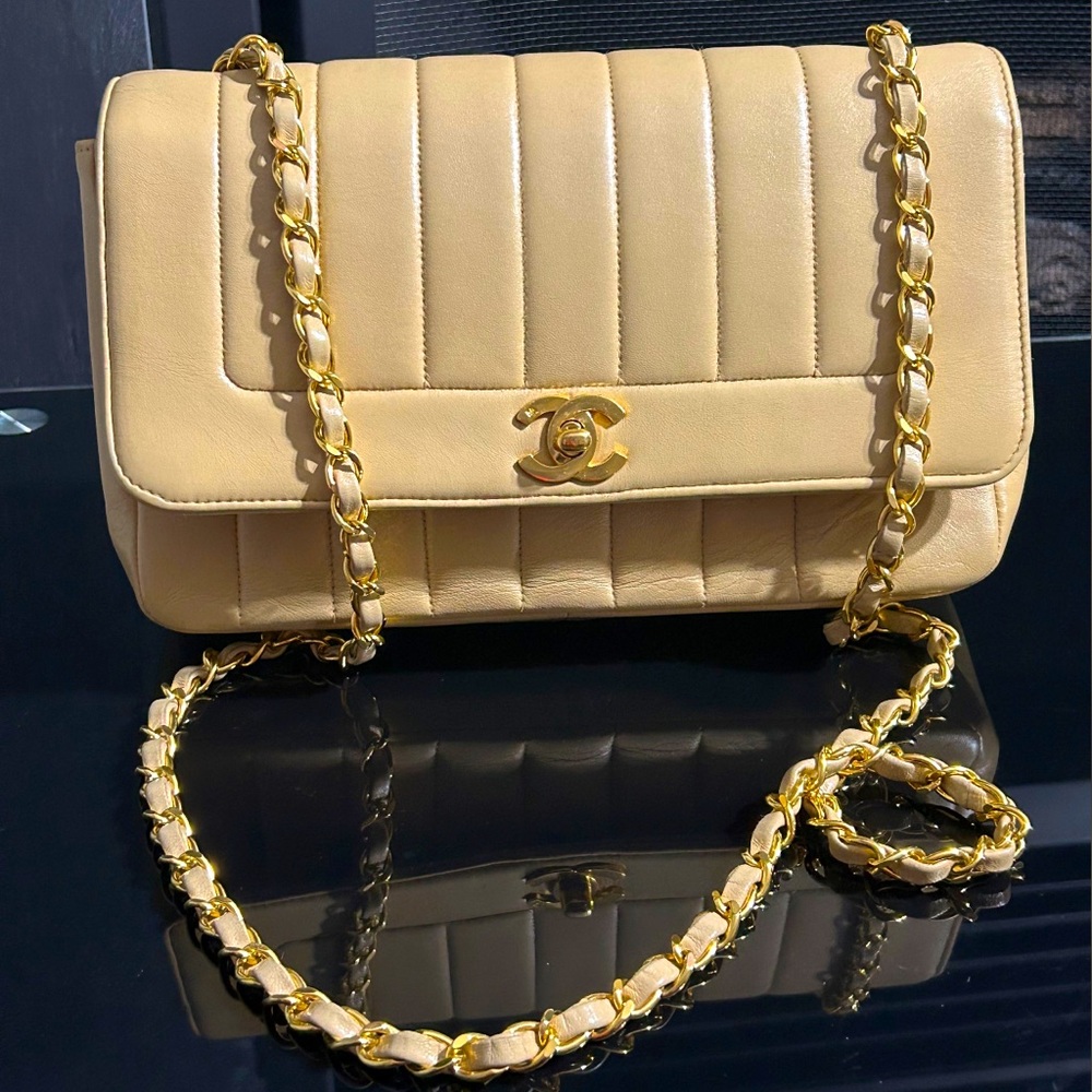 CHANEL Mademoiselle Single Flap Beige Lambskin
Shoulder Bag